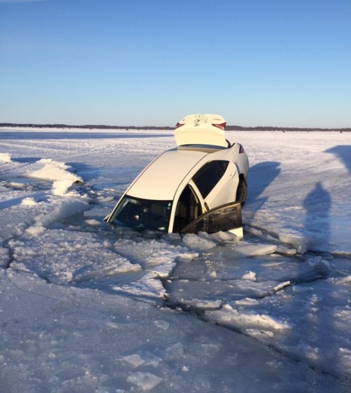 Vehicle Through The Ice On Lake Simcoe