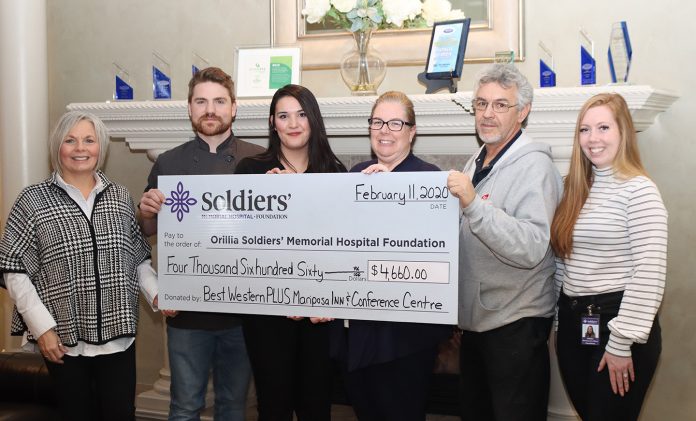 Best Western presents a cheque for $4,660 to Soldiers'