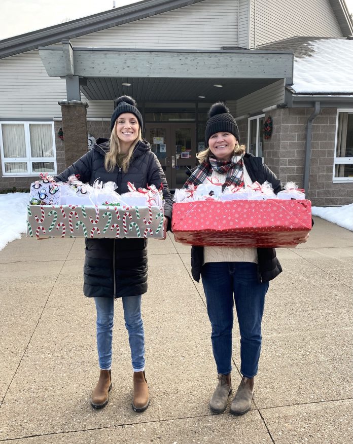 Sarah and Jennifer Stevenson drop off gifts at the Salvation Army. Photo courtesy of Jennifer Stevenson of the Muskoka Shoebox Project