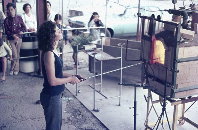 Kathy Ashby demonstrating glassblowing at the Toronto Harbourfront in 1974