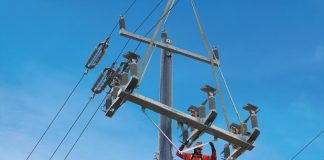 A Hydro One employee installs a smart switch. Since 2018, Hydro One has added more than 2,300 smart devices to its system. Photo courtesy of Hydro One