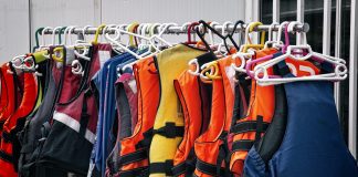 A row of lifejackets. The Lifesaving Society reminds Ontarians to always wear PFDs while boating.