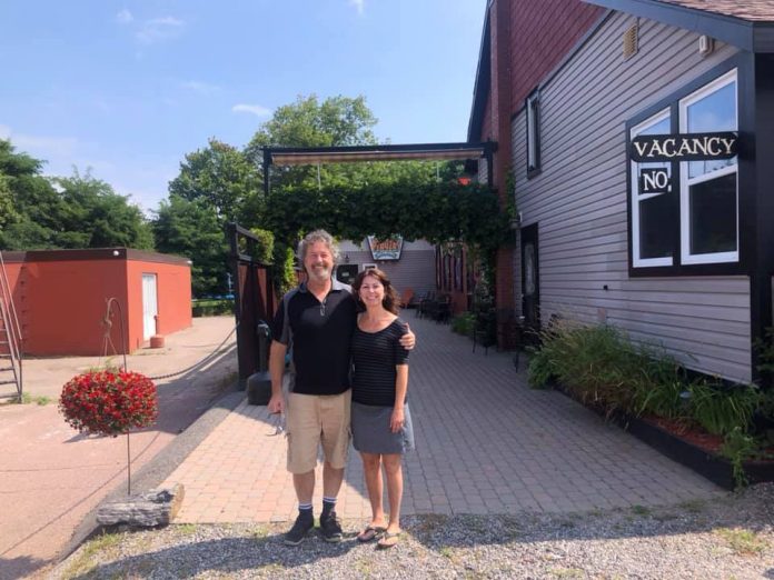Peter's Players Peter's Players: Peter and Michelle Swanek in front of their former venue and inn