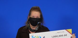 Lotto Max Maxmillions Winner Roberta Davidson of Washago with her $1,000,000,000 cheque.