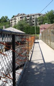 Honouring victims of residential schools: Orange ribbons tied on the fence at Bracebridge Falls