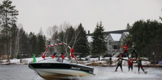 The Santa Claus Charity Water Ski Show is returning to Kearney on Nov. 6. Skiers make a pyramid on the water.
