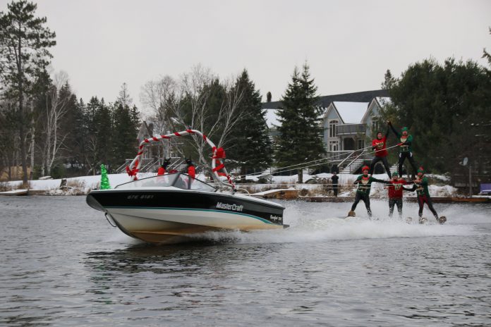 The Santa Claus Charity Water Ski Show is returning to Kearney on Nov. 6. Skiers make a pyramid on the water.