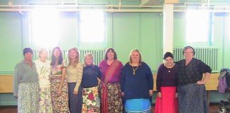 Members of the Muskoka Indigenous Friendship Community wearing the ribbon skirts they made