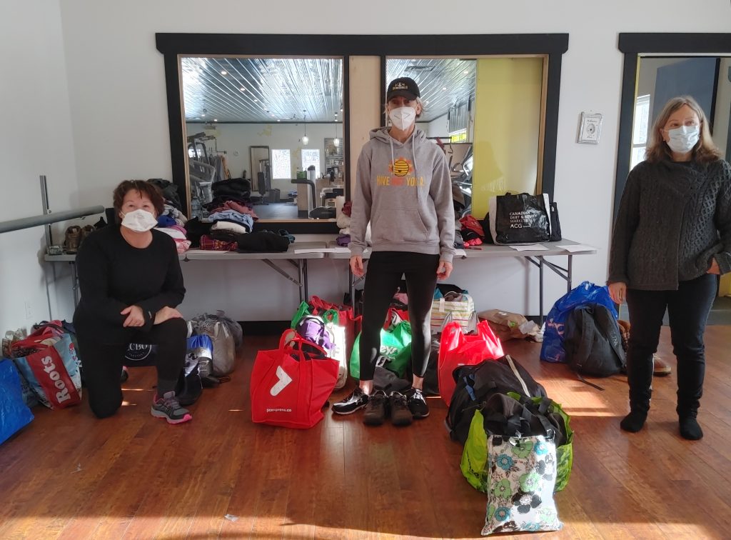 Support for homeless and struggling locals: Fyonna Vanderwerf works to put together cozy kits with volunteers Kim and Kara
