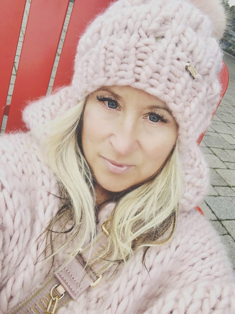 Facebook page fiasco: Theresa Robinson, the business owner and artist behind Muskoka Knits, wearing her own work