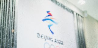 Beijing 2022 Olympic logo through a rainy pane of glass