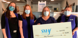 Fabricare Cleaning Center presents a cheque for $50,000 to the South Muskoka Hospital Foundation
