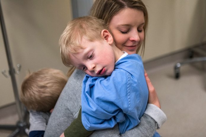 A mother and her child embracing. Photo courtesy of the South Muskoka Hospital Foundation