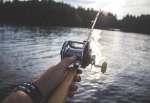 Fishing rod and line over a lake
