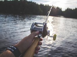 Fishing rod and line over a lake