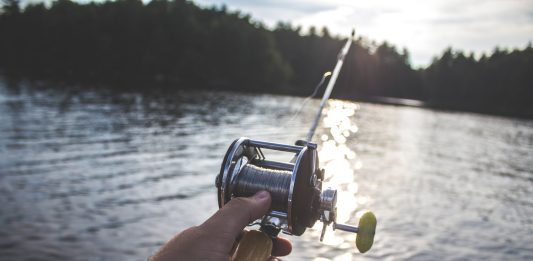 Fishing rod and line over a lake