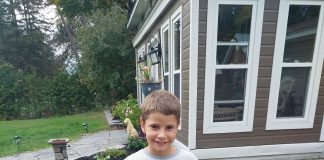 Khai Tonello with his tackle box and fishing equipment