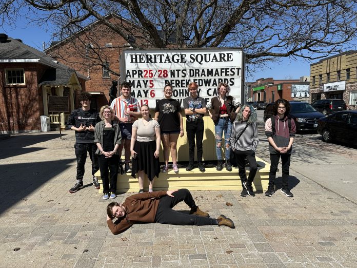 GHS Students with the DramaFest sign at Gravenhurst Opera House
