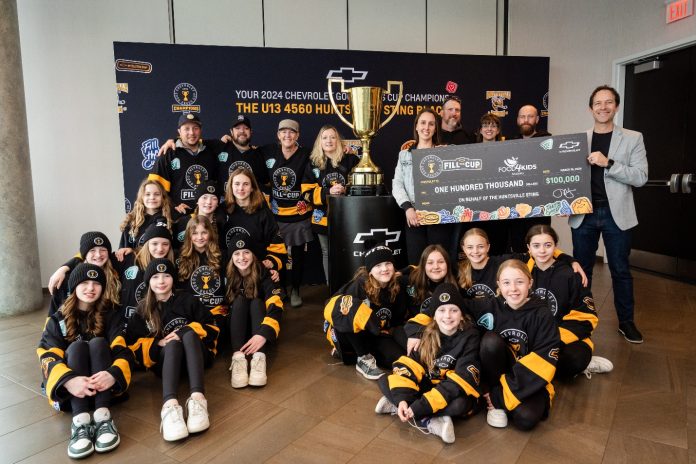 The Huntsville Sting U13-Black hockey team after winning the Good Deeds Cup and $100,000 for Food4Kids Muskoka