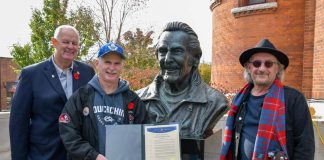Orillia Mayor Don McIsaac, festival committee president John Winchester and committee member Steve Porter at the Gordon Lightfoot Day Proclamation in 2023