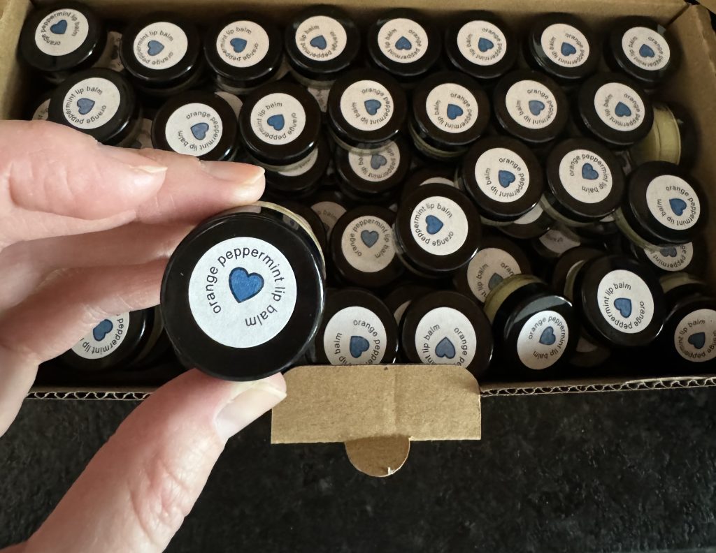 Shoebox Raiser Donations, donated orange peppermint lip balm