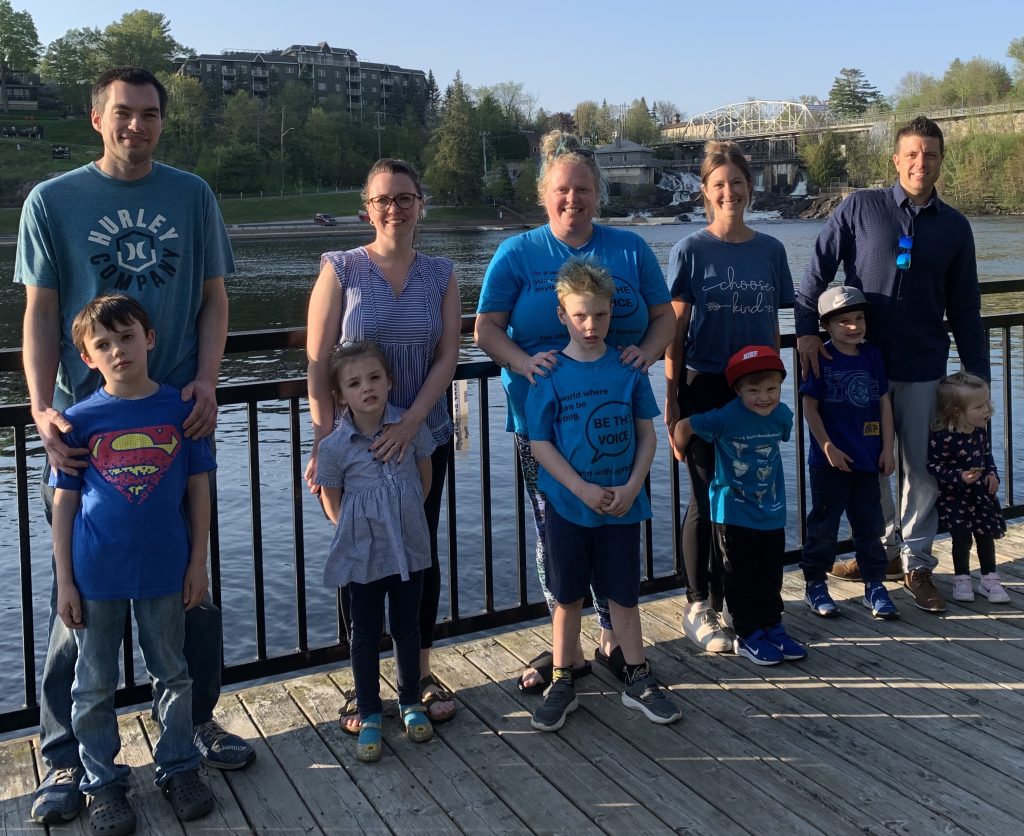 Nash and Jody Hamilton (centre) with the McCann family and the Roberts family at Bracebridge Falls for Apraxia Awareness Day in 2024